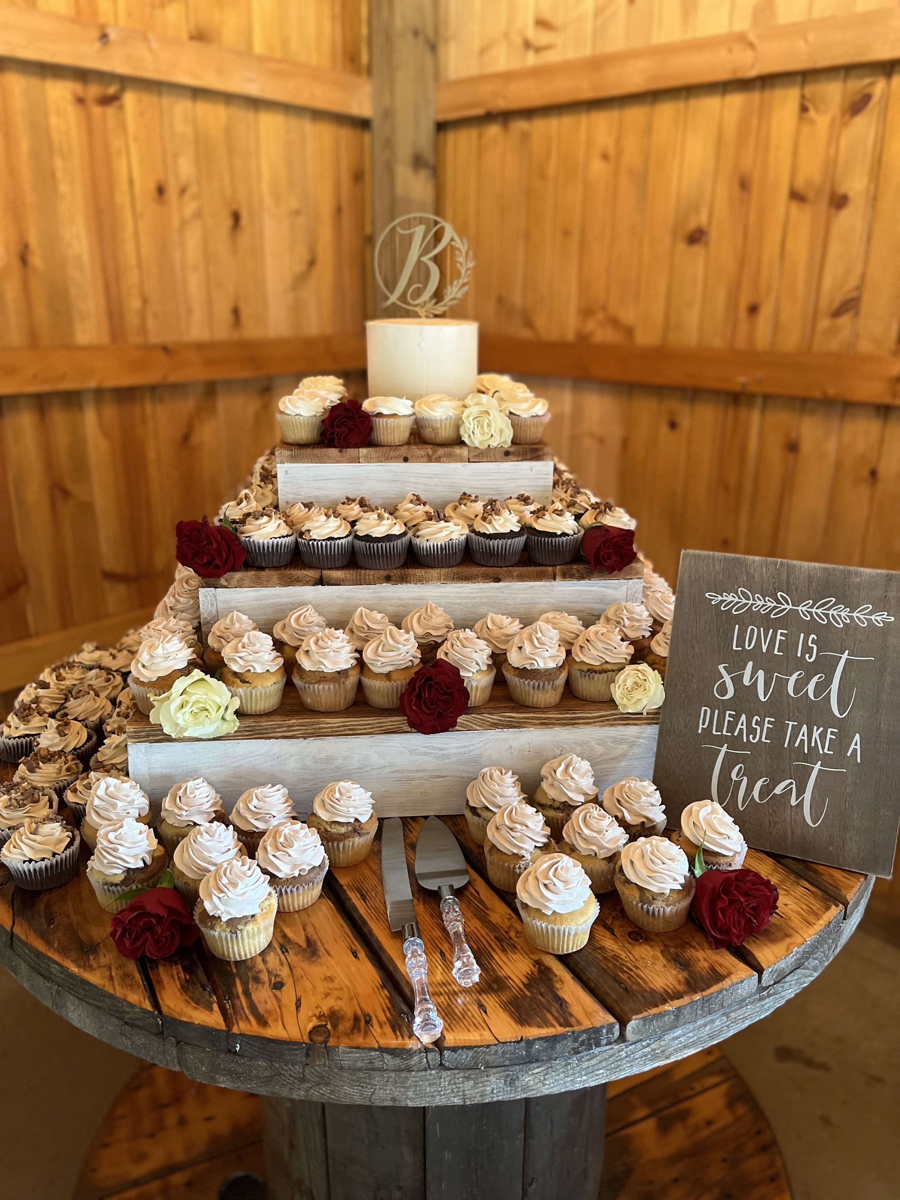 Cupcake tower with small wedding cake